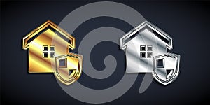 Gold and silver House with shield icon isolated on black background. Insurance concept. Security, safety, protection