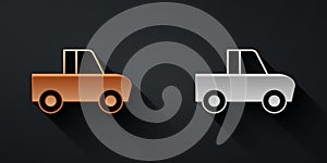 Gold and silver Pickup truck icon isolated on black background. Long shadow style. Vector