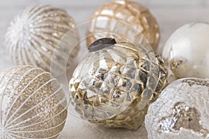 Gold and silver shimmering structured christmas baubles