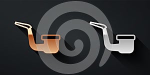 Gold and silver Smoking pipe with smoke icon isolated on black background. Tobacco pipe. Long shadow style. Vector