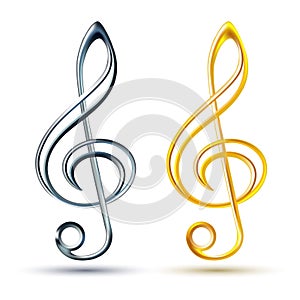 Gold and silver treble clef on white background photo