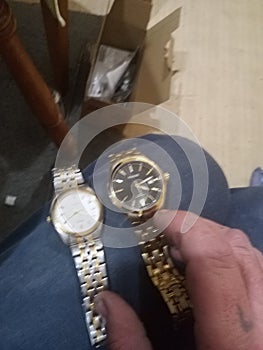 Gold and silver watch lusso gold watch brands are Seiko and pulsar photo