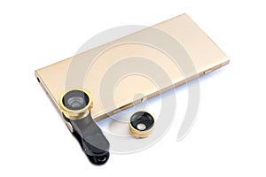 Gold smartphone with lens isolated on white background. Golden mobile phone with lenses and clip isolated