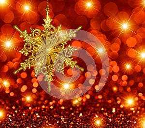 Gold Snowflake Star on Red Stars Background