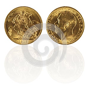 Gold sovereign with reflection