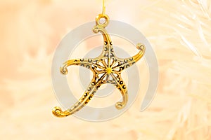 Gold starfish pendant