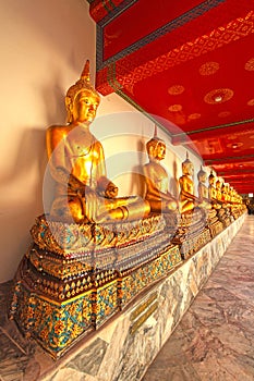 Gold statues of the Buddha abreast