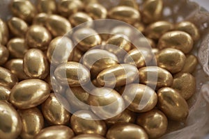 Gold sugared almonds for a marriage