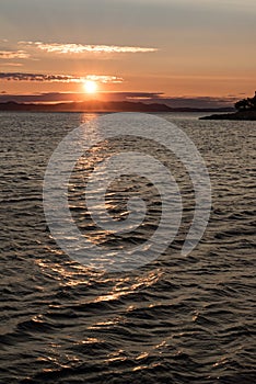 Gold sunset over sea in Croatia photo