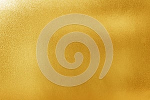 Gold texture background for design. Shiny yellow metal or foil surface material