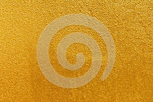 Gold texture background. Shiny bright gold textured background