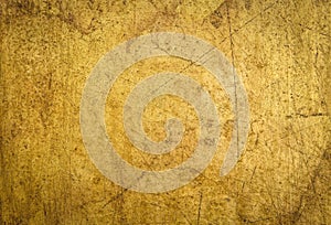 Gold texture of old wooden manuscript box.Gilded texture on vintage wooden box