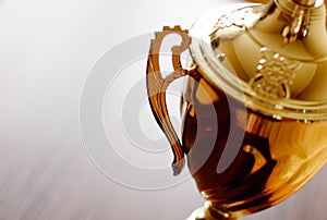 Gold trophy award close up photo