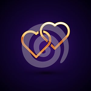 Gold Two Linked Hearts icon isolated on black background. Romantic symbol linked, join, passion and wedding. Happy Women