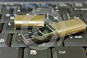 Gold USB disk and keyboard