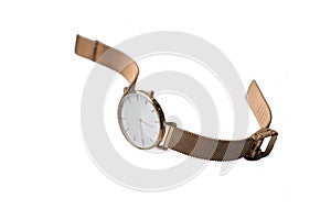 A gold watch isolated on a white background