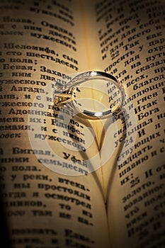 Gold wedding Ring on a bible