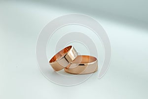 Gold wedding rings. The concept of marriage, family relationships, wedding paraphernalia