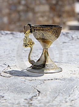 Gold wineglass with ornament (with path)