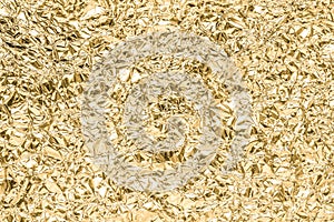 Gold wrinkled paper texture abstract background