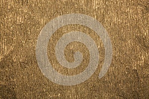 Gold wrinkled paper texture abstract background. Gold paper texture.