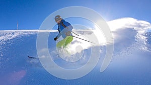 Goldeck - A skier going down the groomed slope