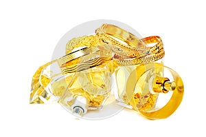 Golden accessory and perfumes