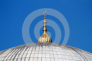 Golden alem on top of the mosque domes in Istanbul photo