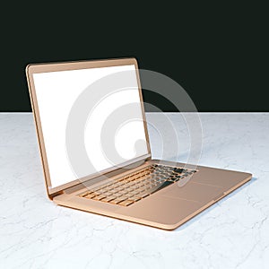 Golden anodize laptop on marble table