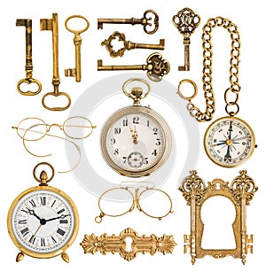 golden antique accessories. vintage keys, clock, compass, glasses, pocket watch, frame