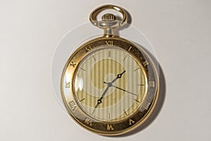 Golden, antique pocket watch