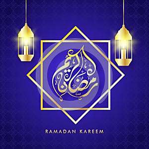 Golden Arabic Calligraphy Of Ramadan Kareem Over Rub-El-Hizab Frame with Hanging Illuminate Lantern on Blue Islamic Floral