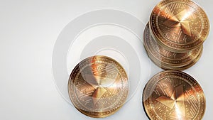 Golden ardor coins falling on white background