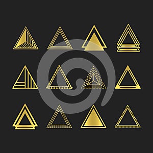 Golden art deco and line equilateral triangles motifs and icons set on black photo