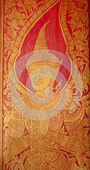 The golden art at the door in temple.