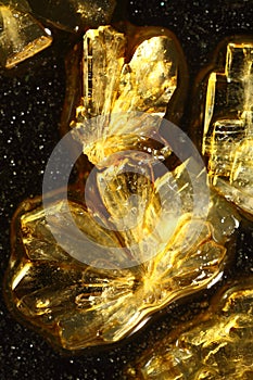 Golden ascorbic acid crystals photo