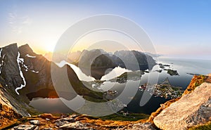 Golden aura over Reinebringen, with Reinefjorden mirroring the sky in Lofoten