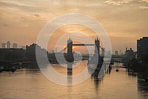 Golden Autumn sunrise over Tower Bridge in London.