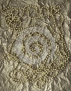 Golden background with beads.