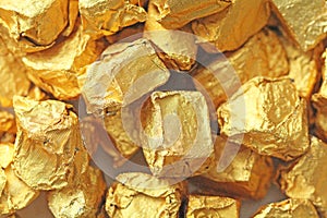 Golden Background. Ingots or Nuggets of Pure Gold. Gold leaf. Te