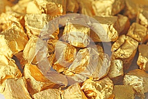 Golden Background. Ingots or Nuggets of Pure Gold. Gold leaf. Te