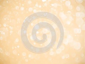 Golden background with soft bokeh lights