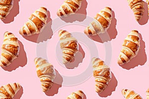 Golden Baked Croissants on Warm Pink Background for Culinary Concepts