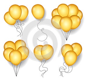 Golden ballons with rope cords