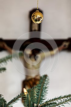 Golden bauble on a christmas tree