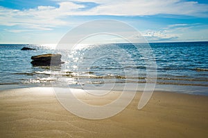 Golden beach blue sea and blue sky