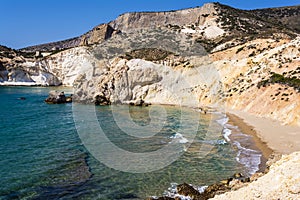 Golden beach and coastline at the Greek island of Milos
