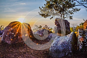 Golden beam of the morning sun shining through the rocks, The beauty of nature in the morning, Beautiful nature background. Travel