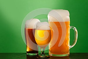 Golden beer in glass with foam, alcohol beverage,  lager froth