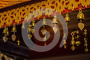 Golden Bell at roof of pavillion around golden pagoda in Wat Phra That Doi Suthep in Chiangmai Thailand